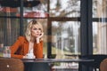 Dejected Caucasian female at the office desk