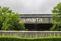 Marta transit sign in white letters