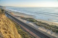 Del Mar Southern California beach landscape with railroad along sea and cliff Royalty Free Stock Photo