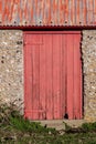 A delapidated barn door