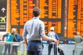 Delay of flight, people passengers waiting in airport