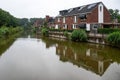 Delden, Overijssel, The Netherlands, July 13, 2024 - Residential houses reflecting in the water