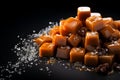 Delectable caramels showcased on a dark background with text space