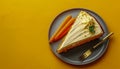 Delectable Carrot Cake Slice on a Grey Plate with Fresh Carrots and a Gold Fork on a Bright Yellow Background Royalty Free Stock Photo