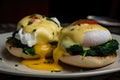 delectable close-up of vegetarian Eggs Benedict with sauteed spinach, tangy feta cheese, and perfectly poached eggs on a crispy