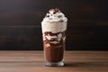 Delectable hot chocolate milkshake with a heavenly whipped cream topping served in a stylish glass