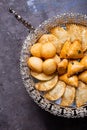 Delectable pastries arranged beautifully on a silver platter.