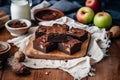 delectable spread of brownies arranged on table alongside fresh apples