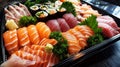 A delectable sushi platter featuring an assortment of nigiri and sashimi, beautifully arranged with fresh garnishes, ready to Royalty Free Stock Photo