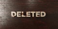 Deleted - grungy wooden headline on Maple - 3D rendered royalty free stock image