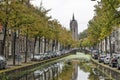 Delft canal and leaning church tower Royalty Free Stock Photo