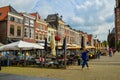 Delft, the Netherlands, August 2019. View on Markt square. The town hall, the new church and the characteristic Dutch houses