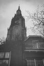 Delft, Netherlands - January 6 2019: Reflection in the canal of the tower of the Nieuwe Kerk, New Church, in the old city center Royalty Free Stock Photo