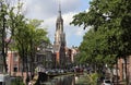 Canal and church tower in Delft, Holland Royalty Free Stock Photo