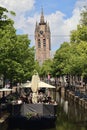 Canal and church tower in Delft, Holland Royalty Free Stock Photo