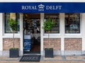 Delft, South Holland, The Netherlands - Facade of the Royal Delft luxury shop selling porcelain