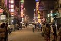 Delhi evening city on traditional street with old neon advertising