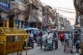 Delhi, India - April 2019 : Crowd of people Life at New Delhi city center from old Delhi