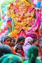 Delhi, India - August 21,2020 : People carrying Hindu God Idol Ganesh for Holy Immersion Ganpati Visharjan at The Ganges River
