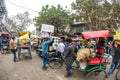 Delhi, India - December 11, 2017: crowd and traffic on street at Chandni Chowk, Old Delhi, famous travel destination in India.