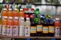 Delhi, India, 2020. Indian cold drink juices kept for display at a roadside vendor shop during summers. Local Soft drink brands