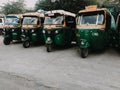 Delhi, India, 15 June 2020 - Group Of Indian Auto Rikshaw on the street tuk-tuk used by tourists and local as means of