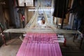 Man works as weaver in the carpet workshop