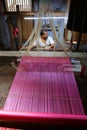 Man works as weaver in the carpet workshop