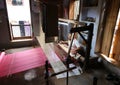 Man works as weaver in the carpet workshop