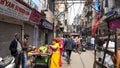 DELHI, INDIA - MARCH 11, 2019: a fruit wallah on a street of chandni chowk in delhi Royalty Free Stock Photo