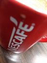 Delhi, India - March 20th 2020:A closeup shot of Coffee Cup from Nescafe on table Royalty Free Stock Photo