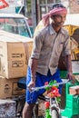 DELHI, INDIA - OCTOBER 22, 2016: Cyclo rickshaw driver in the center of Delhi, Indi Royalty Free Stock Photo