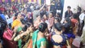 Delhi, India, October 02,2023 - Devotees performing spiritual dance in front of Durga Idol, Durga Puja celebration at Kali Bari