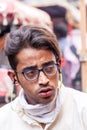 DELHI, INDIA - OCTOBER 22, 2016: Face of a tired cyclo rickshaw driver in the center of Delhi, Indi