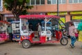 DELHI, INDIA - SEPTEMBER 19, 2017: Autorickshaw pink in the street, paharganj, there are many tourist stay in this area