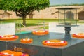 DELHI, INDIA - SEPTEMBER 25 2017: Modern grave in Rajghat, New Delhi as memorial at Mahatma Gandhis body cremation place Royalty Free Stock Photo