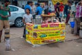 Delhi, India - September 25, 2017: Outdoor view of small cart selling food in Paharganj Delhi with muslim shoppers