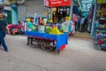 Delhi, India - September 25, 2017: Outdoor view of small cart selling food in Paharganj Delhi with muslim shoppers