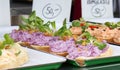 Deli sandwiches at the delicatessen stand at the farmers market in Prague Royalty Free Stock Photo