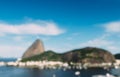 Deliberately defocused abstract view of Sugarloaf Mountain and Rio de Janeiro Brazil skyline reflecting on Botafogo Bay