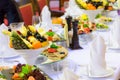 Delicacies, snacks and fruit on the festive table in the restaurant. Celebration. Catering. Banquet table Royalty Free Stock Photo