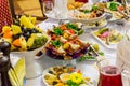 Delicacies, snacks and fruit on the festive table in the restaurant. Celebration. Catering. Banquet table Royalty Free Stock Photo