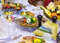 Delicacies, snacks and fruit on the festive table in the restaurant. Celebration. Catering. Banquet table Royalty Free Stock Photo