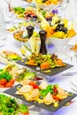 Delicacies, snacks and fruit on the festive table in the restaurant. Celebration. Catering. Banquet table Royalty Free Stock Photo