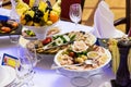 Delicacies, snacks and fruit on the festive table in the restaurant. Celebration. Catering. Banquet table Royalty Free Stock Photo