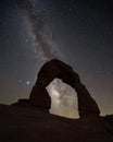 Delicate Arch Silhouette at night with the Milky Way Galaxy