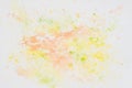 Delicate autumn, tender soft yellow and orange shades, color stain on white paper. Abstract watercolor background