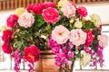 Delicate beautiful bouquet of roses, orchid and other flowers. Closeup. Royalty Free Stock Photo