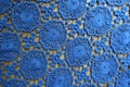 Delicate blue lacy fabric on wood