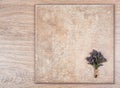 Delicate bouquet of flowers and a wooden abstract background.